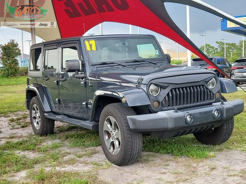 Used 2017 Jeep Wrangler Unlimited Sahara w/ Dual Top Group AWD/4WD image 1