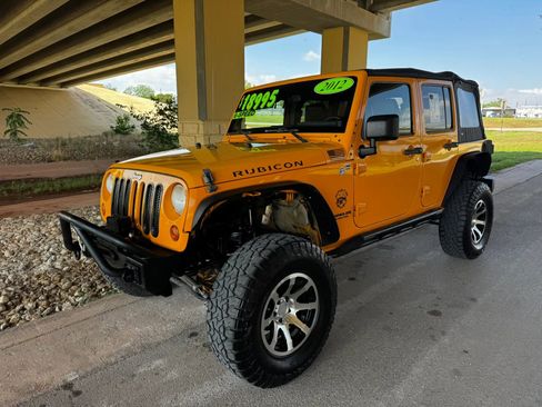 Used 2012 Jeep Wrangler Unlimited Rubicon w/ Dual Top Group image 7