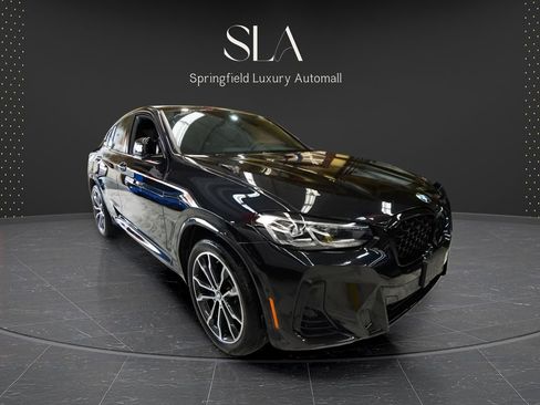 Used 2024 BMW X4 xDrive30i w/ Premium Package AWD/4WD image 1