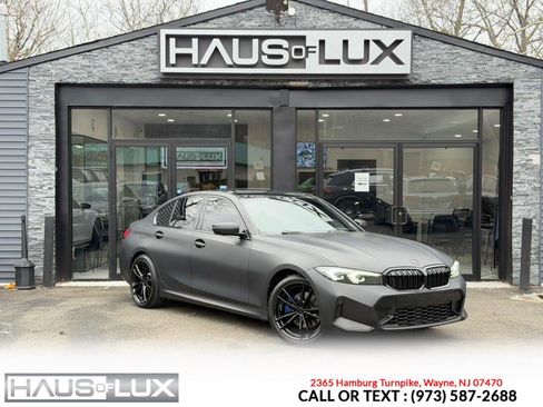 Used 2023 BMW 330i xDrive Sedan w/ M Sport Package image 1