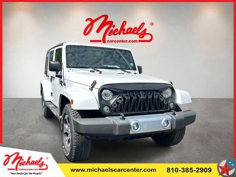 Used 2017 Jeep Wrangler Unlimited Sahara w/ Dual Top Group AWD/4WD image 1