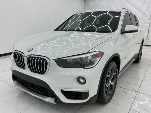 Used 2018 BMW X1 xDrive28i AWD/4WD image 1