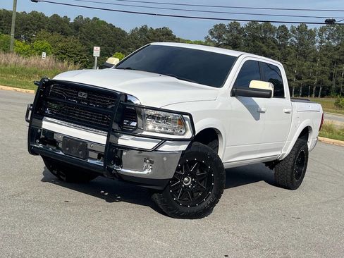 Used 2014 RAM 1500 Laramie w/ Convenience Group AWD/4WD image 1