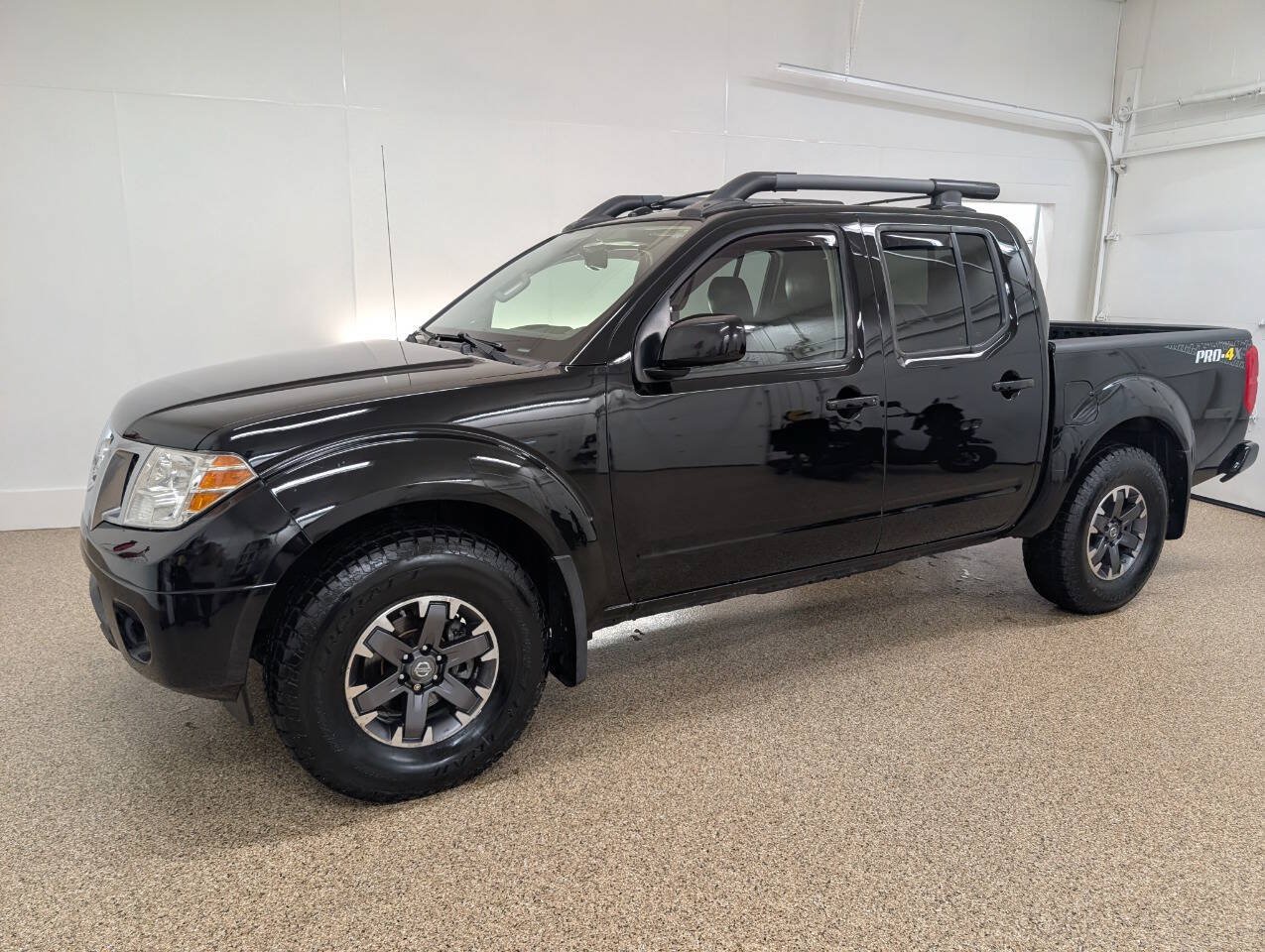 Used 2015 Nissan Frontier PRO-4X AWD/4WD image 1