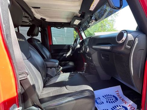 Used 2013 Jeep Wrangler Unlimited Sahara w/ Dual Top Group AWD/4WD image 13