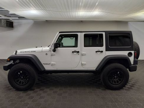 Used 2014 Jeep Wrangler Unlimited Rubicon w/ Connectivity Group AWD/4WD image 2