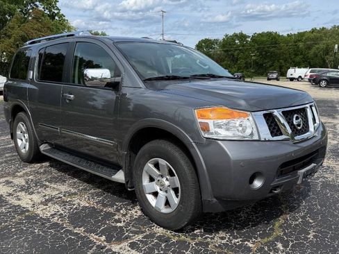 Used 2015 Nissan Armada Platinum w/ 2nd Row Captain Seat Package AWD/4WD image 1