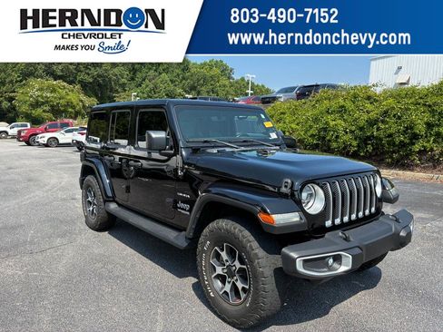 Used 2021 Jeep Wrangler Unlimited Sahara AWD/4WD image 1