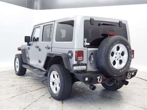 Used 2013 Jeep Wrangler Unlimited Sahara w/ Dual Top Group AWD/4WD image 3