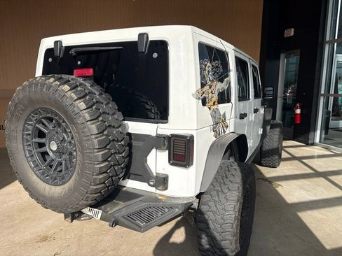 Used 2011 Jeep Wrangler Unlimited Sahara w/ Mopar Chrome Edition Group AWD/4WD image 14