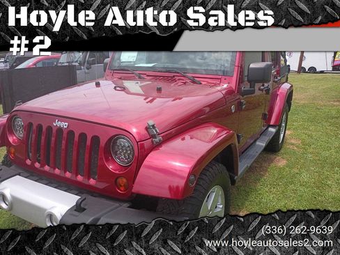 Used 2012 Jeep Wrangler Unlimited Sahara w/ Max Tow Pkg AWD/4WD image 1