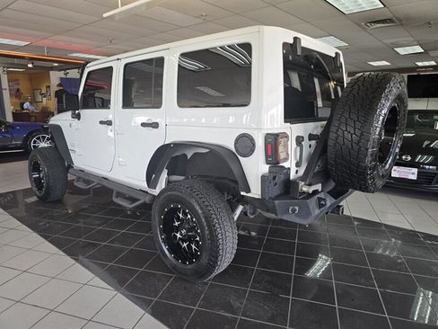 Used 2015 Jeep Wrangler Unlimited Sahara w/ Dual Top Group AWD/4WD image 6