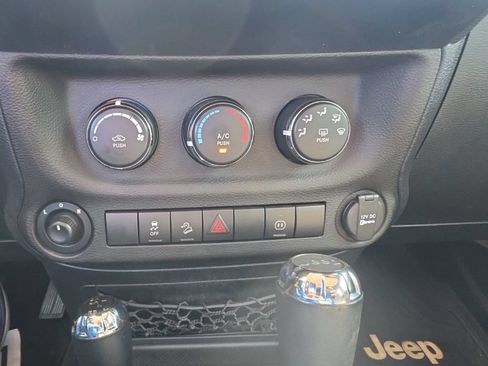 Used 2012 Jeep Wrangler Unlimited Sahara w/ Dual Top Group AWD/4WD image 14