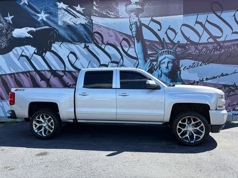 Used 2018 Chevrolet Silverado 1500 LT w/ Texas Edition AWD/4WD image 1