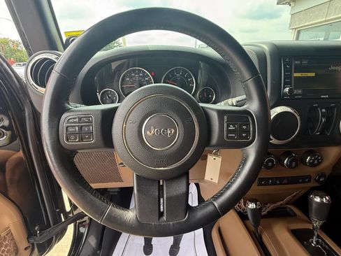 Used 2014 Jeep Wrangler Unlimited Rubicon w/ Dual Top Group AWD/4WD image 14