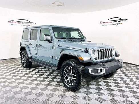 Used 2024 Jeep Wrangler Sahara w/ Dual Top Group image 1