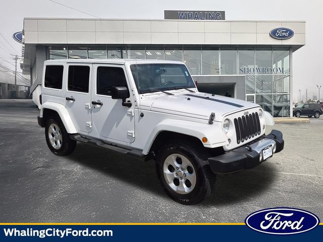 Used 2014 Jeep Wrangler Unlimited Sahara w/ Dual Top Group AWD/4WD image 1