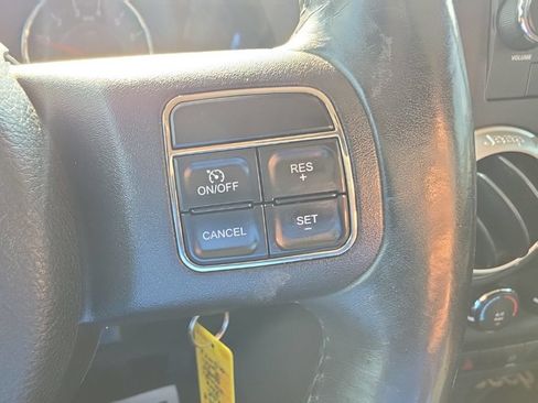 Used 2012 Jeep Wrangler Unlimited Sahara w/ Dual Top Group AWD/4WD image 11