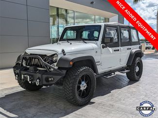 Used 2017 Jeep Wrangler Unlimited Sport w/ Mopar Black Appearance Group image 1