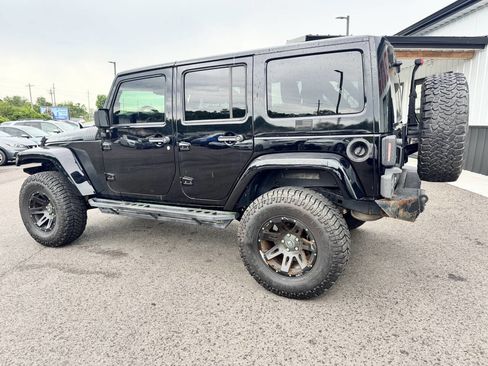 Used 2014 Jeep Wrangler Unlimited Rubicon w/ Dual Top Group AWD/4WD image 12