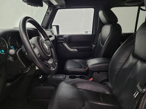 Used 2014 Jeep Wrangler Unlimited Rubicon w/ Dual Top Group AWD/4WD image 17