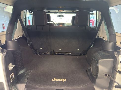 Used 2014 Jeep Wrangler Unlimited Sahara w/ Dual Top Group AWD/4WD image 28