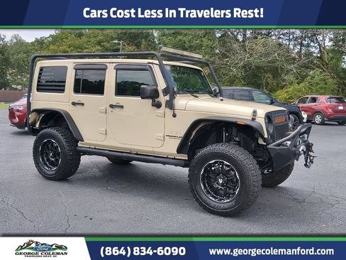 Used 2011 Jeep Wrangler Unlimited Sahara w/ Connectivity Group AWD/4WD image 1