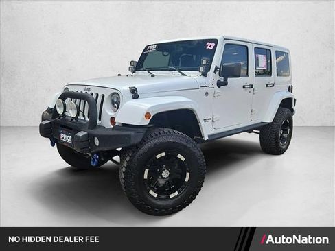 Used 2013 Jeep Wrangler Unlimited Sahara AWD/4WD image 1