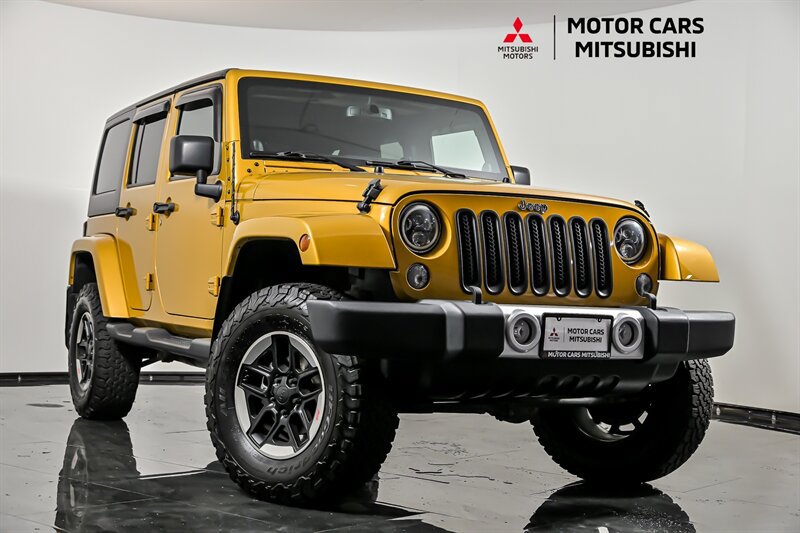 Used 2014 Jeep Wrangler Unlimited Sahara w/ Dual Top Group AWD/4WD image 1
