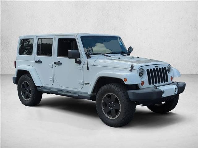 Used 2012 Jeep Wrangler Unlimited Sahara AWD/4WD image 3