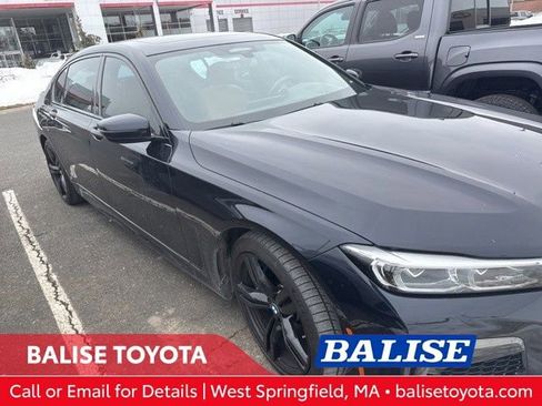 Used 2021 BMW 750i xDrive w/ M Sport Package image 1