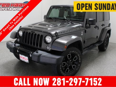 Used 2017 Jeep Wrangler Unlimited Sahara AWD/4WD image 1