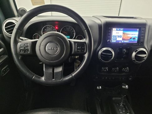 Used 2014 Jeep Wrangler Unlimited Rubicon w/ Dual Top Group AWD/4WD image 22