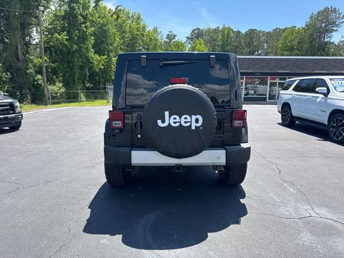 Used 2013 Jeep Wrangler Unlimited Sahara w/ Mopar Chrome Edition Group AWD/4WD image 4