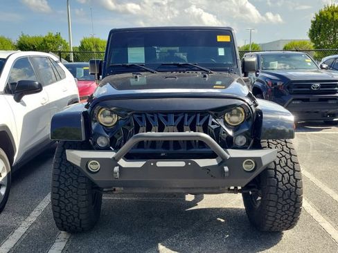 Used 2015 Jeep Wrangler Unlimited Sahara w/ Dual Top Group AWD/4WD image 2