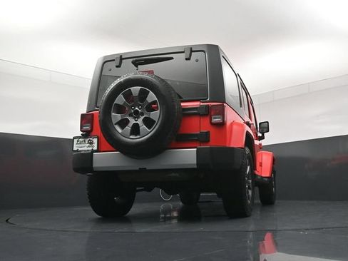 Used 2013 Jeep Wrangler Unlimited Sahara w/ Dual Top Group AWD/4WD image 23
