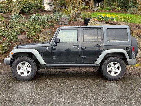Used 2011 Jeep Wrangler Unlimited Rubicon w/ Dual Top Group AWD/4WD image 2