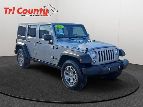 Used 2014 Jeep Wrangler Unlimited Rubicon w/ Dual Top Group image 1