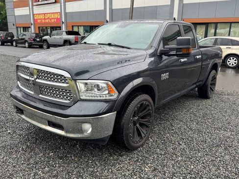 Used 2015 RAM 1500 Laramie w/ Convenience Group AWD/4WD image 1