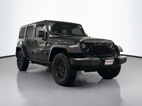 Used 2016 Jeep Wrangler Unlimited Sport image 1