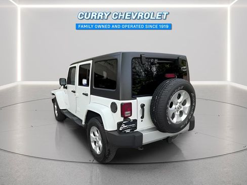 Used 2014 Jeep Wrangler Unlimited Sahara w/ Dual Top Group AWD/4WD image 10