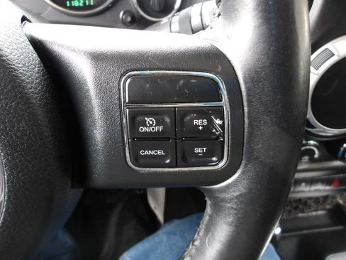 Used 2014 Jeep Wrangler Unlimited Sahara w/ Mopar Chrome Edition Group AWD/4WD image 16