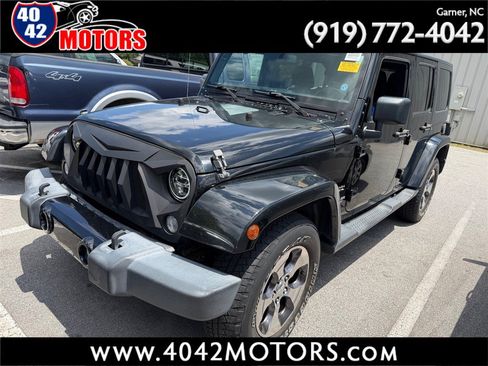Used 2016 Jeep Wrangler Unlimited Sahara w/ Connectivity Group AWD/4WD image 1