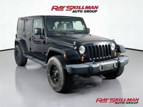 Used 2011 Jeep Wrangler Unlimited Sport AWD/4WD image 1