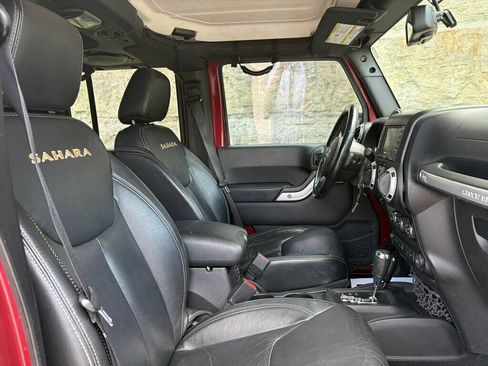 Used 2013 Jeep Wrangler Unlimited Sahara w/ Dual Top Group AWD/4WD image 26
