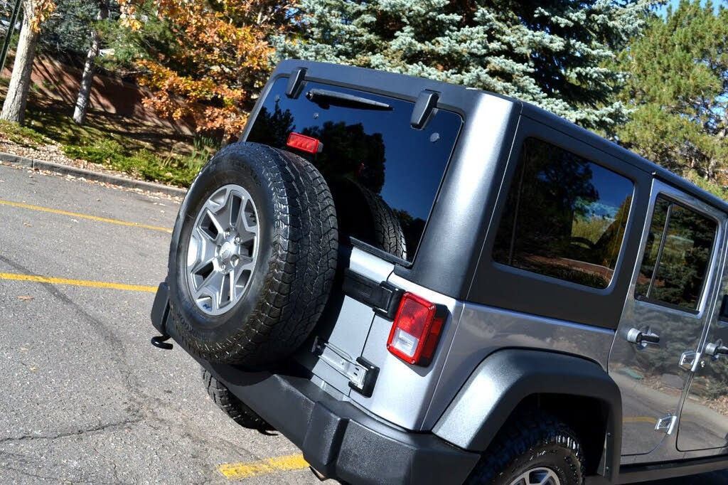 Used 2015 Jeep Wrangler Unlimited Rubicon w/ Dual Top Group AWD/4WD image 11