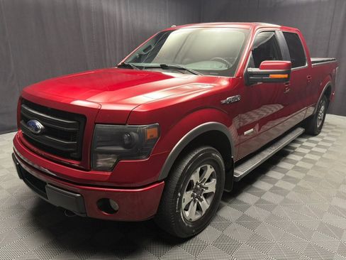 Used 2014 Ford F150 FX4 Pickup 4D 6 1/2 ft w/ Equipment Group 402A Luxury AWD/4WD image 2