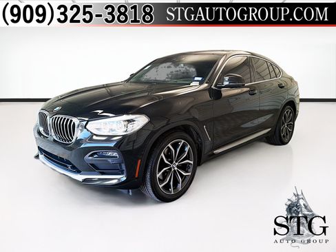 Used 2021 BMW X4 xDrive30i w/ Premium Package AWD/4WD image 1