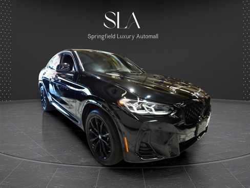 Used 2024 BMW X4 xDrive30i AWD/4WD image 1