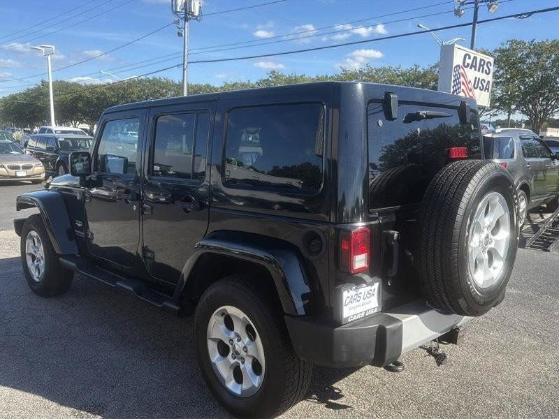 Used 2014 Jeep Wrangler Unlimited Sahara w/ Dual Top Group AWD/4WD image 6